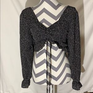 Black and white polka dot long sleeved blouse